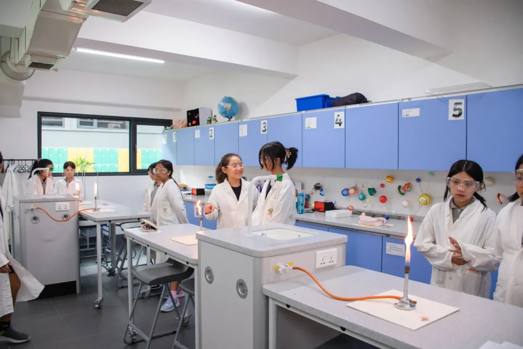 network international school students in science lab